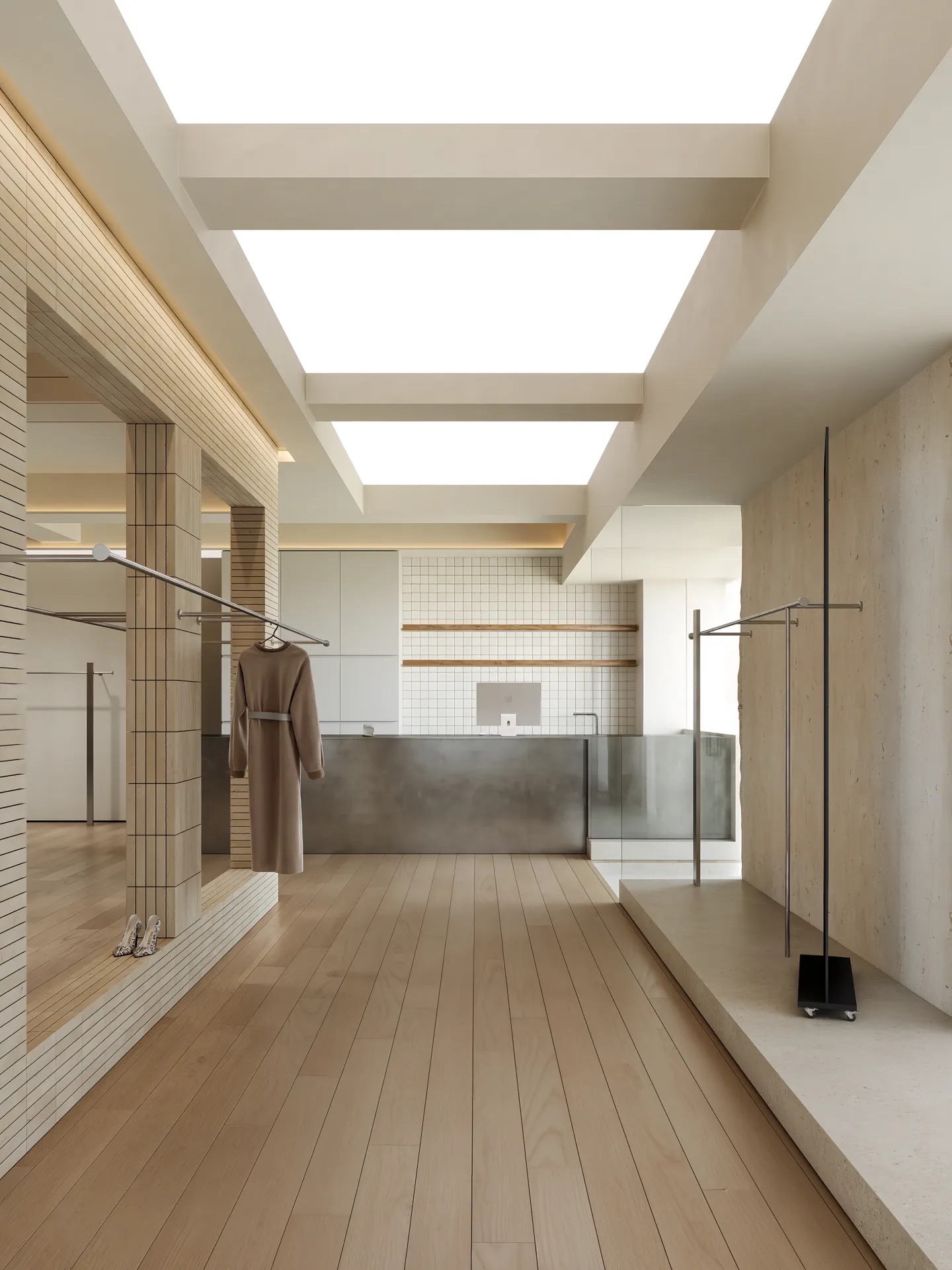 Minimalist fashion boutique with timber flooring